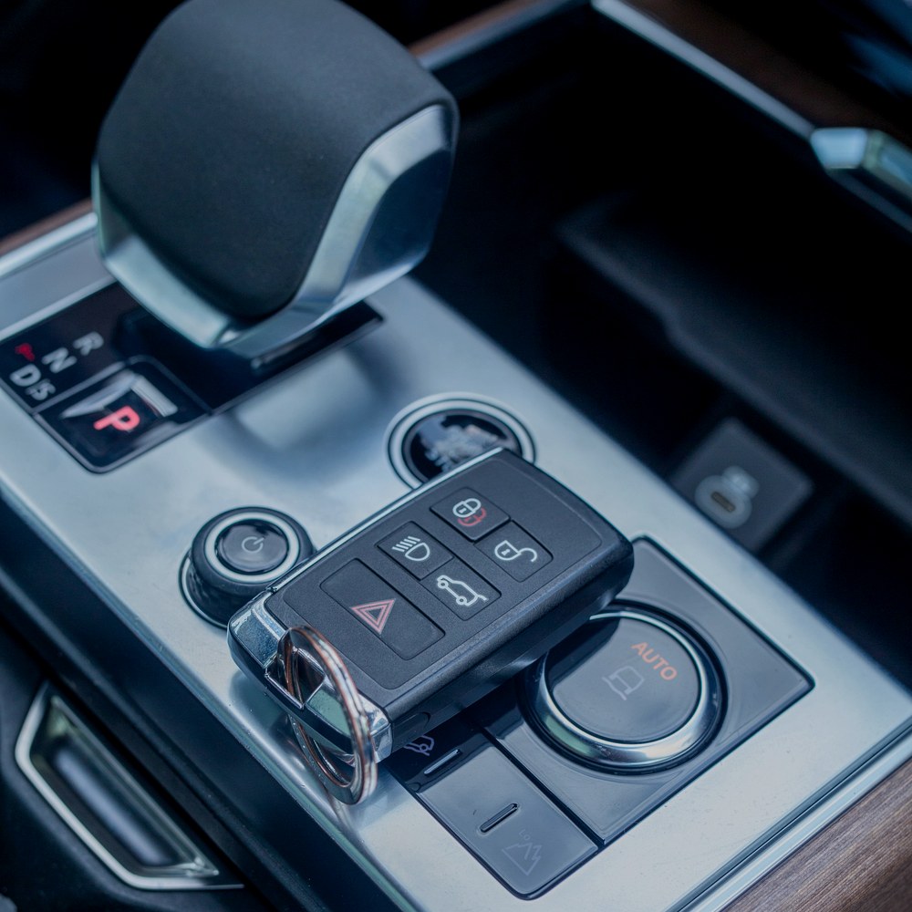 Smart key fob in a vehicle console