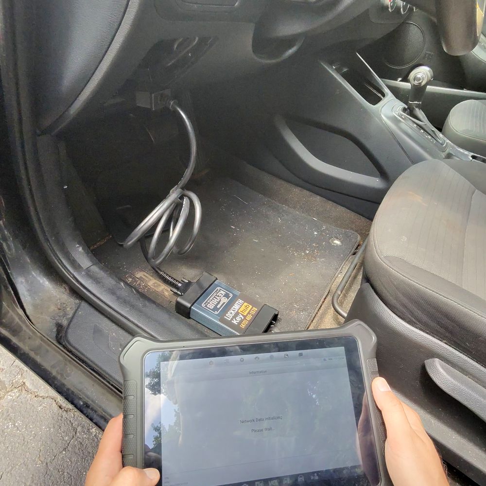 Diagnostic tablet connected through the OBD port of a customer vehicle in Atlanta GA